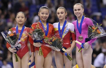 women uneven bars podium